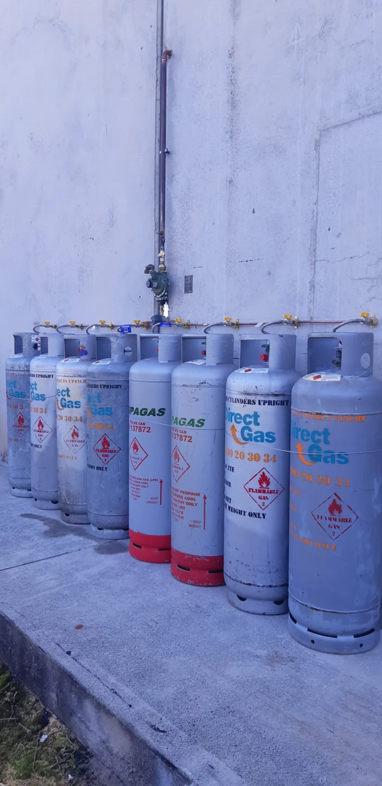 Row of LPG gas cylinders at a commercial site