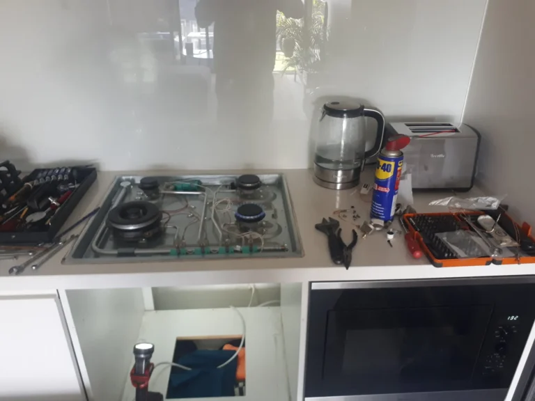 Gas cooktop removed from the benchtop during installation